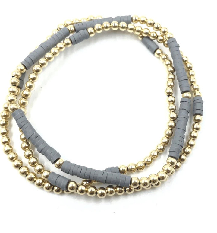 erin gray coastal bracelet 3 stack in gold and dark grays